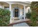 Elegant front entrance with pillars and a decorative wreath on the door at 3604 Brampton Dr., Myrtle Beach, SC 29588