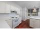 Bright kitchen featuring hardwood floors, and views into breakfast area at 3604 Brampton Dr., Myrtle Beach, SC 29588