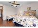 This is a bedroom featuring two beds, nautical-themed bedding, and a ceiling fan at 405 21St Ave. S # 2H, North Myrtle Beach, SC 29582