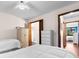 Inviting bedroom featuring two twin beds, white dressers, and ensuite bathroom access at 405 21St Ave. S # 2H, North Myrtle Beach, SC 29582
