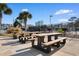 Community picnic area featuring tables, benches, grills, and views of the city at 405 21St Ave. S # 2H, North Myrtle Beach, SC 29582