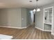 Open living area with wood-look floors, neutral paint, and dining area at 4390 Daphne Ln. # D, Murrells Inlet, SC 29576