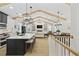 Spacious living and kitchen area with exposed beam ceilings and an open floor plan at 5368 Ocean Village Dr., Myrtle Beach, SC 29577