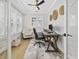 Bright home office featuring natural light, a modern desk, and a comfortable chair; ideal for remote work at 5368 Ocean Village Dr., Myrtle Beach, SC 29577