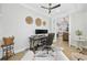 Well-lit office space with dual monitors, decorative wall baskets, and hardwood floors offers a stylish workspace at 5368 Ocean Village Dr., Myrtle Beach, SC 29577