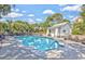Relaxing pool area with comfortable lounge chairs surrounded by lush landscaping at 5368 Ocean Village Dr., Myrtle Beach, SC 29577