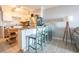 A well-equipped kitchen with modern appliances, ample counter space, and cozy breakfast bar at 5601 N Ocean Blvd. # B306, Myrtle Beach, SC 29577