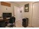 Well-lit office space includes a desk and decor at 5601 N Ocean Blvd. # B306, Myrtle Beach, SC 29577