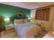 Relaxing bedroom with a queen-sized bed and nautical themed decor at 5905 S Kings Highway # 432-A, Myrtle Beach, SC 29575