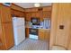 Functional kitchen space with classic cabinets and appliances, providing a practical cooking area at 5905 S Kings Highway # 432-A, Myrtle Beach, SC 29575