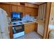 Efficient kitchen layout with standard appliances and ample cabinet space at 5905 S Kings Highway # 432-A, Myrtle Beach, SC 29575