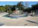 Vibrant splash pad area, fully fenced, featuring water features, shallow pools, and lounge chairs at 5905 S Kings Highway # 432-A, Myrtle Beach, SC 29575