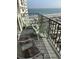 Balcony view with chairs and beach overlooking the ocean at 5905 South Kings Hwy. # 1116, Myrtle Beach, SC 29575