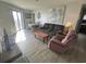 Comfortable living room with modern decor and access to a balcony at 5905 South Kings Hwy. # 1116, Myrtle Beach, SC 29575