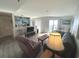 Inviting open-concept living area with bright kitchen and balcony access at 5905 South Kings Hwy. # 1116, Myrtle Beach, SC 29575