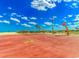Outdoor basketball court on a sunny day with a sandy beach and the ocean in the background at 6001 - 1527 S Kings Hwy., Myrtle Beach, SC 29575