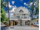 Charming two-story coastal home with a covered front porch and spacious ground-level parking at 6001 - 1527 S Kings Hwy., Myrtle Beach, SC 29575