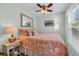 Bright bedroom with comfortable bedding and decorative nautical accents at 6001-5124 S Kings Hwy., Myrtle Beach, SC 29575
