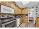 Modern kitchen featuring stainless steel appliances and light wood cabinets at 6001-5124 S Kings Hwy., Myrtle Beach, SC 29575
