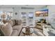 Bright living room with stylish decor, comfortable sofa, and inviting ambiance at 6001-5124 S Kings Hwy., Myrtle Beach, SC 29575