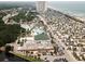 Expansive aerial view showcasing the community's proximity to the beach, water park, and various amenities at 6001-O4 S Kings Hwy., Myrtle Beach, SC 29575