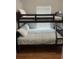 Cozy bedroom featuring a bunk bed with decorative pillows and patterned bedding at 6001-O4 S Kings Hwy., Myrtle Beach, SC 29575