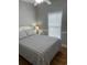 Serene bedroom with comfortable bed, soft lighting, and relaxing atmosphere at 6001-O4 S Kings Hwy., Myrtle Beach, SC 29575