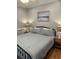 Comfortable bedroom featuring a cozy bed, calming decor, and ample natural light at 6001-O4 S Kings Hwy., Myrtle Beach, SC 29575