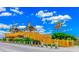 Picturesque boardwalk with intricate wooden railings and gazebo-style structures under a blue sky at 6001-O4 S Kings Hwy., Myrtle Beach, SC 29575