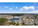 An elevated view of 6203 Catalina Drive, featuring a serene pond and community pool at 6203 Catalina Dr. # 1822, North Myrtle Beach, SC 29582