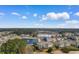 Community aerial showcasing 6203 Catalina Drive near a pond and neighborhood pool at 6203 Catalina Dr. # 1822, North Myrtle Beach, SC 29582