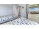 Bedroom shows two beds with fish-themed bedding, a large closet, and a TV mounted in an entertainment center at 6203 Catalina Dr. # 1822, North Myrtle Beach, SC 29582