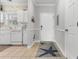 Entryway featuring tile flooring, a white front door, and a view into the kitchen at 6203 Catalina Dr. # 1822, North Myrtle Beach, SC 29582