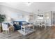 Bright and airy living room with modern decor, comfortable seating, stylish furnishings, and hardwood floors at 6203 Catalina Dr. # 1822, North Myrtle Beach, SC 29582