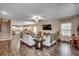Bright, open-concept living room seamlessly connects to the kitchen and dining area for easy entertaining at 624 Blackberry Ave., Murrells Inlet, SC 29576
