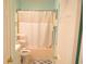 Bright bathroom with a toilet, shower, and vanity at 649 Tupelo Ln. # 13E, Longs, SC 29568