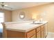 Kitchen with tile floor and breakfast bar; seamless transition from living to cooking space at 649 Tupelo Ln. # 13E, Longs, SC 29568