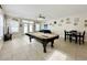 Game room with billiard table, lounge area and table perfect for entertaining guests at 703 37Th Ave. S, North Myrtle Beach, SC 29582