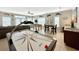 Spacious game room with an air hockey table, foosball table, and comfortable seating, ideal for entertaining guests at 703 37Th Ave. S, North Myrtle Beach, SC 29582