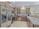 Well-equipped kitchen featuring stainless steel appliances, granite countertops, and ample cabinet space for storage at 703 37Th Ave. S, North Myrtle Beach, SC 29582