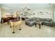 Spacious living room with foosball table, pool table and comfortable gray sectional sofa at 703 37Th Ave. S, North Myrtle Beach, SC 29582