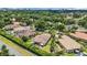 This aerial showcases a private backyard patio and nearby neighborhood cul-de-sac at 7584 Regina Ct., Myrtle Beach, SC 29572