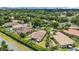 This aerial showcases a private backyard patio and nearby neighborhood cul-de-sac at 7584 Regina Ct., Myrtle Beach, SC 29572