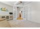 Spacious bedroom with tray ceilings, and French doors leading to the ensuite bathroom and walk-in closet at 7584 Regina Ct., Myrtle Beach, SC 29572