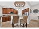 Charming kitchen with granite countertops, stainless steel appliances, and dark wood cabinets at 7584 Regina Ct., Myrtle Beach, SC 29572