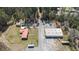 A straight down aerial view highlights the layout of the house and surrounding buildings at 77 Towhee St., Georgetown, SC 29440