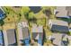 Drone shot of houses nestled in a neighborhood with a community pool and a scenic pond at 804 Yauhannah Dr., Little River, SC 29566