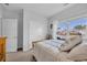 Bright bedroom featuring a large window and closet at 804 Yauhannah Dr., Little River, SC 29566