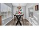 Bright dining area with natural light, modern table, and comfortable seating for four at 804 Yauhannah Dr., Little River, SC 29566
