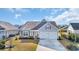 Attractive single-story home featuring a neatly manicured lawn and a convenient two-car garage at 804 Yauhannah Dr., Little River, SC 29566